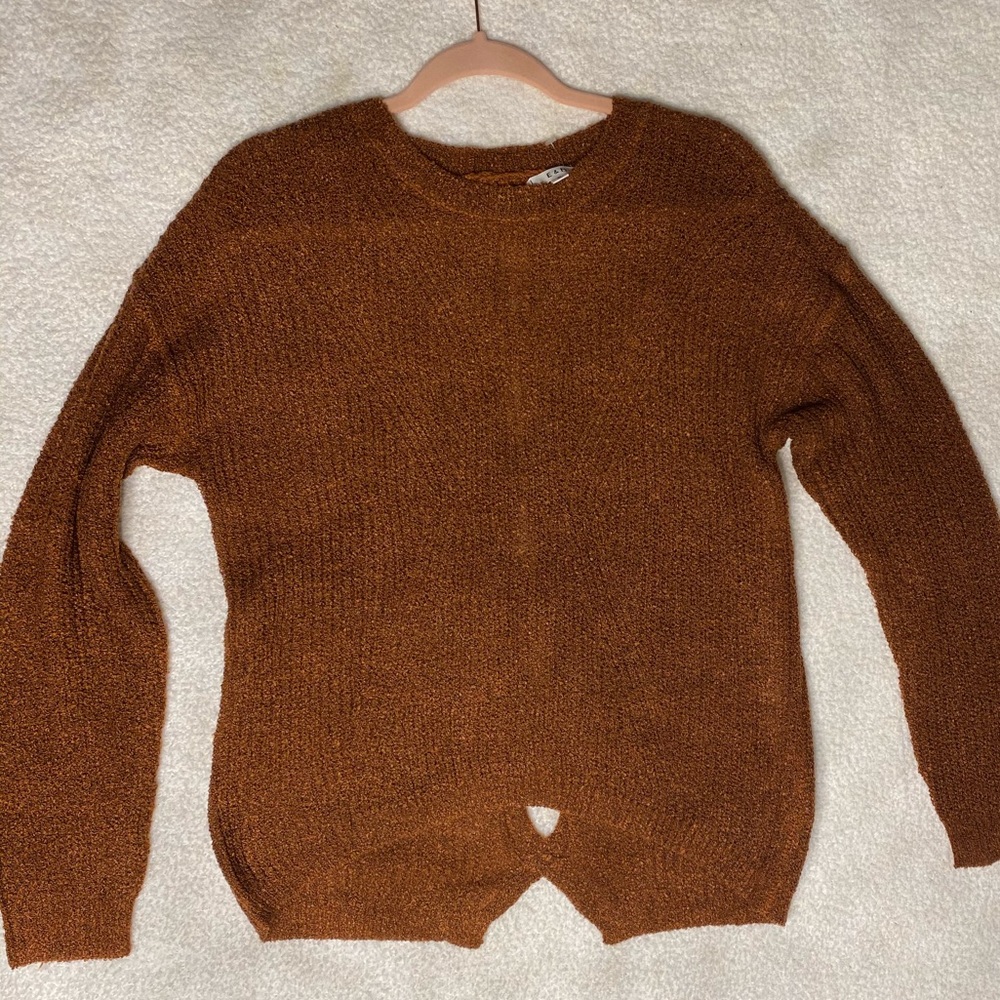Women’s brown long sleeve cozy shirt. Size  small with open detail in the back.